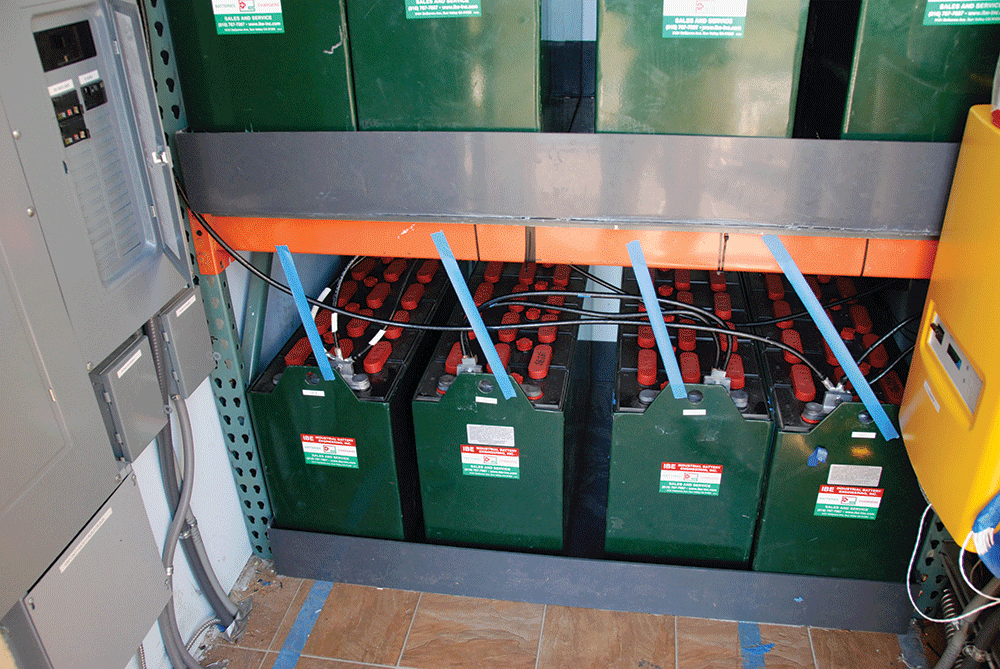 Photo 1. Flooded, deep-cycle lead-acid batteries used in an off-grid home. Courtesy of John Wiles