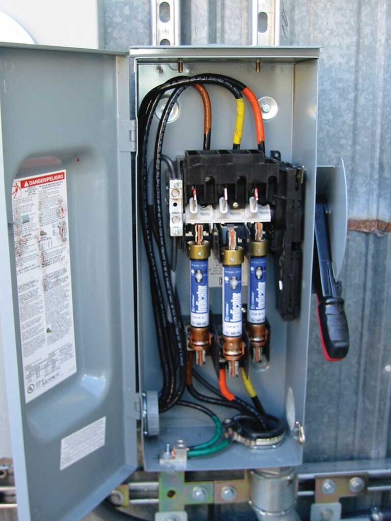 Photo 2. Three-pole fused safety switch on a three-phase ac circuit. Courtesy of John Wiles