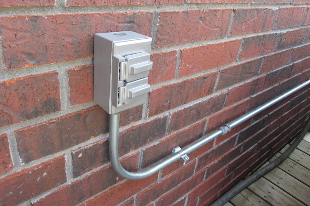 Photo 1b. A location is deemed as a damp location by the AHJ with the appropriate cover.