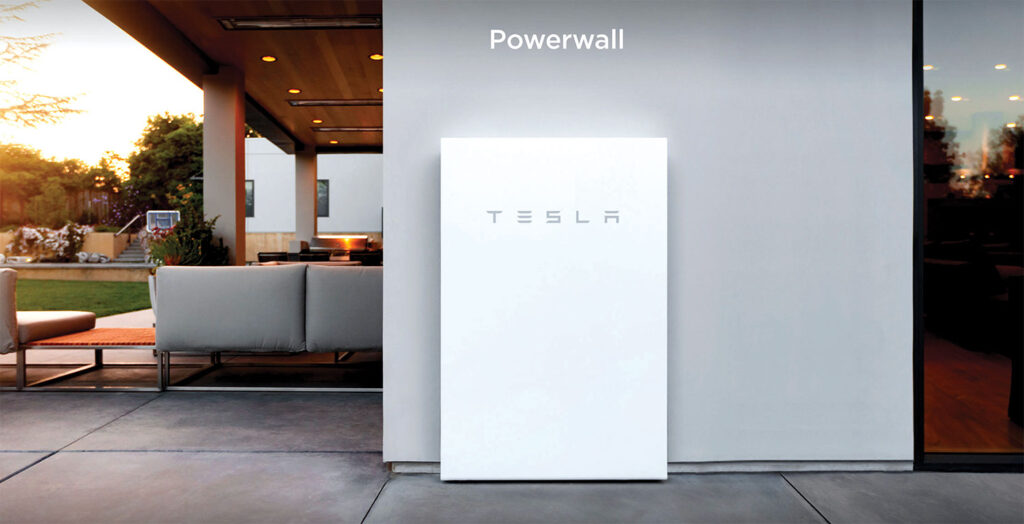 Photo 3. Battery backed-up PV system. Storage and power conversion equipment in a single enclosure that integrates well with house design. Courtesy of Tesla