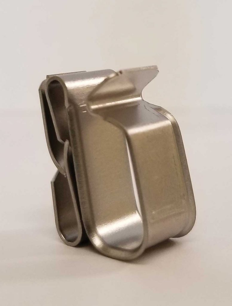 Photo 5. Stainless steel metal cable clip. Note the rounded edges to minimize cable damage. Courtesy of Nine Fasteners Inc.