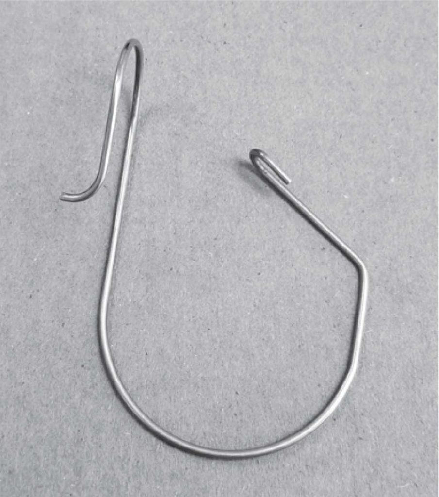 Photo 7. Galvanized steel cable hanger used to bundle cables on ground-mounted PV arrays. Courtesy of Nine Fasteners Inc.