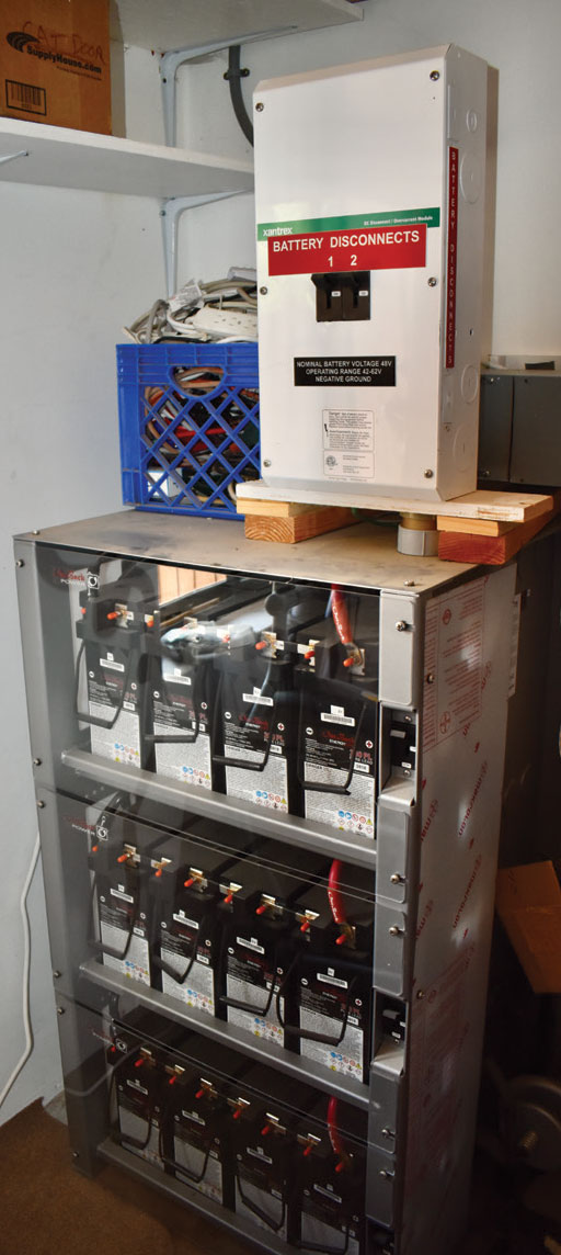 Photo 2. 48 V battery bank consisting of 12, 200 amp hour AGM 12-volt batteries. Courtesy of John Wiles