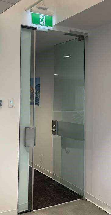 Photo 1. Exit door with a sign