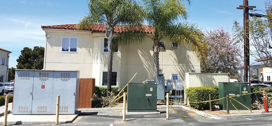 Photo 2. A single utility distribution transformer may supply several dwelling service entrances and have only primary side overcurrent protection.